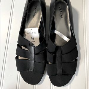 Medina ladies size 9 black slip on wedge shoes with elastic on tops of shoe. New